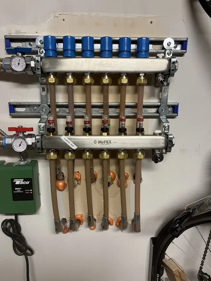 Plumber performing Water Heater Repair at a residential property in La Cienega